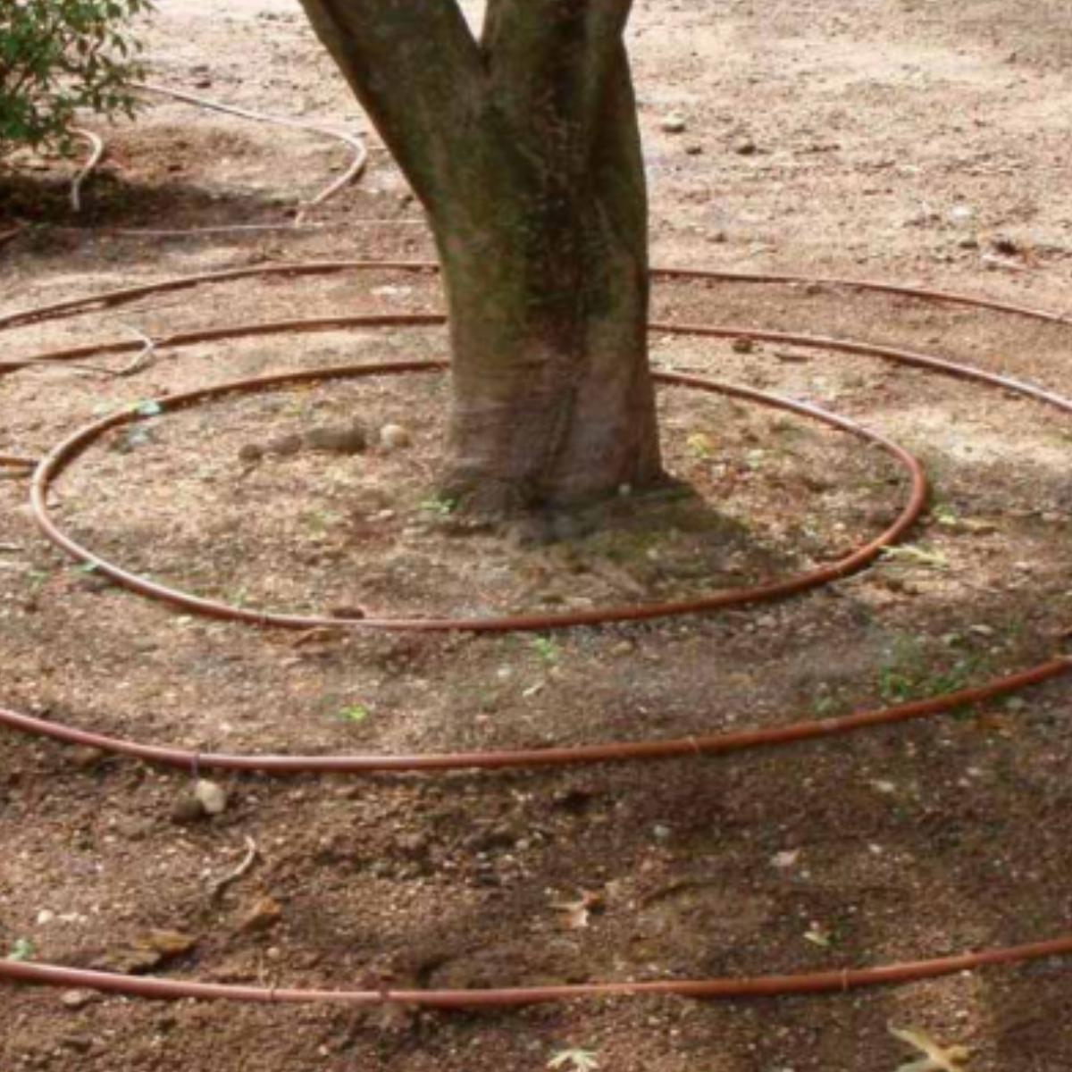 Bruine slang met geïntegreerde druppelaars 16 mm Aqua Control 100 m